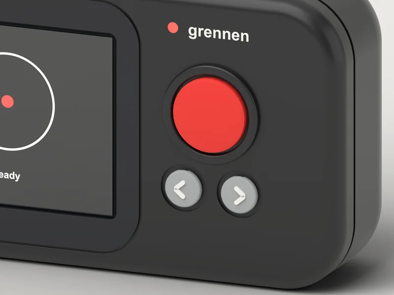 Close-up of the R1 controls: the red button, two keys and the screen