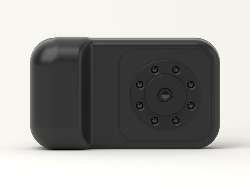 The back of Grennen R1: a small lens inside a ring of lights, on a square panel beside the grip